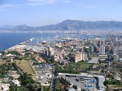 an aerial view of a city and the water at Al Khalisa Apartment by Wonderful Italy in Palermo