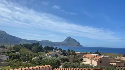 a town with a view of the ocean and mountains at Villa San Vito Bay in Macari