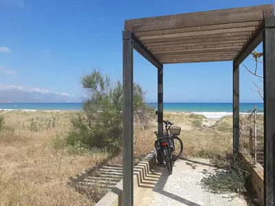a sand dune with a view of the ocean at Limoncello Apri la finestra e respira il profumo del mare Alloggio Spazioso in Sicilia Comfort per 6 Ospiti in Castellammare del Golfo