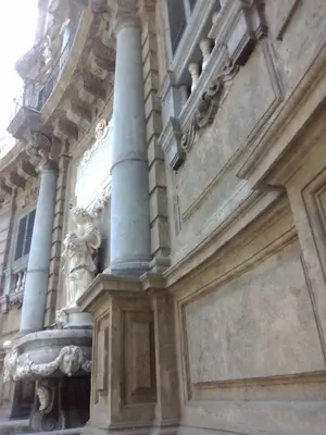 a building with a fountain in front of it at Casamaqueda26, Bilocale indipendente presso palazzo Filangeri-Cutò in Palermo