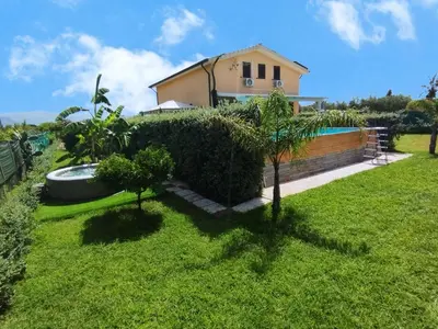 a house with a yard with a swimming pool at Garden Voyages Balestrate in Balestrate