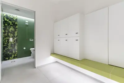 a bathroom with a toilet and a mirror at Ideal Residence & SPA in Alcamo