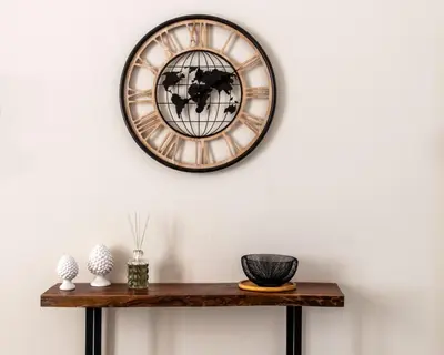 a clock on a wall above a table at Crispi Apartments in Palermo