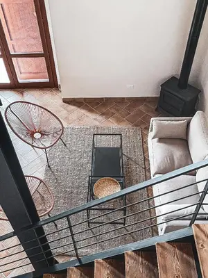 a living room with a couch and a table at Alla Riserva - Villa Riserva dello Zingaro - Scopello in Scopello