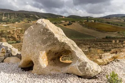 a large rock sitting on top of a mountain at Villa Balata mare e relax in Balata di Baida