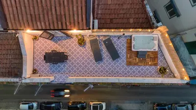 an overhead view of a building with tile roofs at Zisa Top Romantic Terrace & Private outdoor Jacuzzi in Palermo