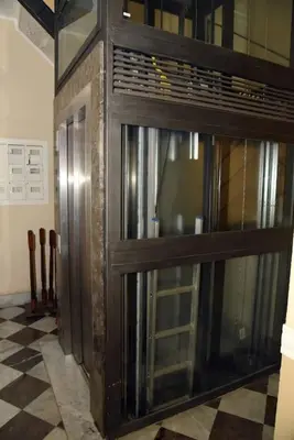 a dressing room with a white table and a mirror at Briaria Apartment in Palermo
