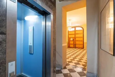 a bathroom with a shower and a toilet and a sink at Briaria Apartment in Palermo