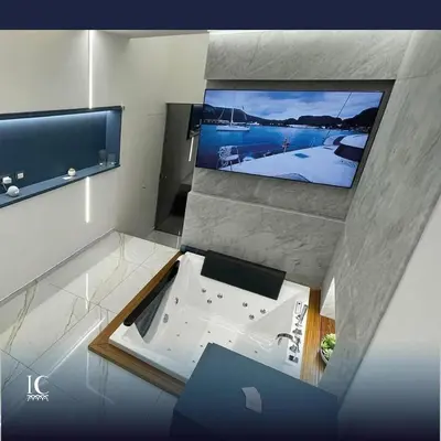 an overhead view of a room with a flat screen tv at I Cappuccini Suite in Palermo