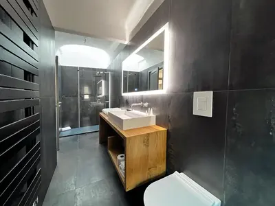 a bathroom with a sink and a shower and a toilet at Gioiamia - Luxury Rooms in Cattedrale in Palermo