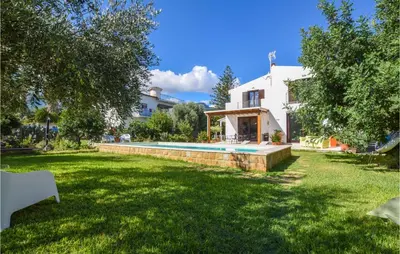 a house with a swimming pool in a yard at Gorgeous Home In Trabia With Wifi in Trabia