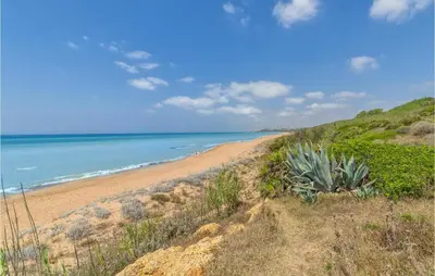 a view of the beach from a bluff at Gorgeous Home In Trabia With Wifi in Trabia