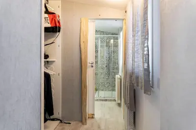 a hallway with a door leading to a closet at ROCCA POLITEAMA Attico Prestigioso ed Eccitante. in Palermo