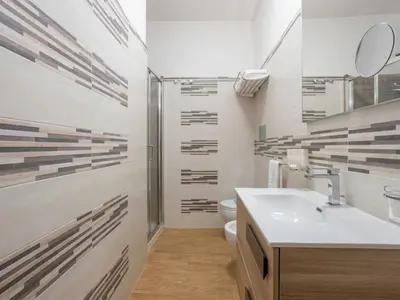 a bathroom with a sink and a toilet at Apartment Sole by Interhome in Balestrate