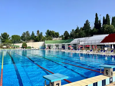 a large outdoor swimming pool with a large swimming pool at Allegroitalia Torre Artale Palermo in Trabia