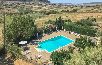 an overhead view of a swimming pool in a field at Amazing Home In San Giuseppe Jato in San Giuseppe Jato