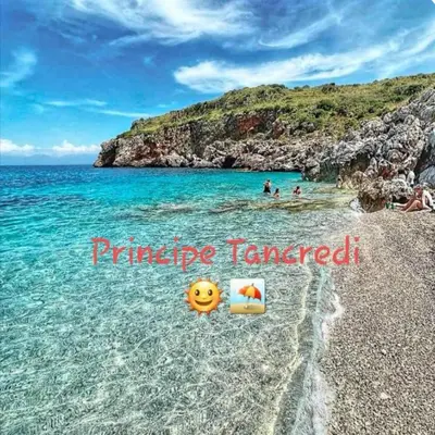 a beach with a smiley face in the water at Principe Tancredi in Castellammare del Golfo