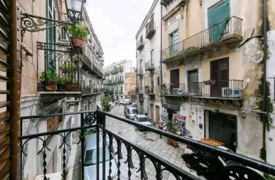a view from a balcony of a street with buildings at DaMé in Palermo