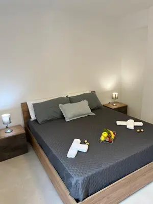 a bedroom with a bed with toys on it at La Terrazza sul Golfo in Castellammare del Golfo