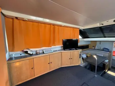 a room with a desk with a television and a deskictericter at Giorgia House Boat in Palermo