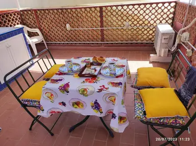 a table with plates of food on top of it at Raggio di sole in Ashur in Palermo