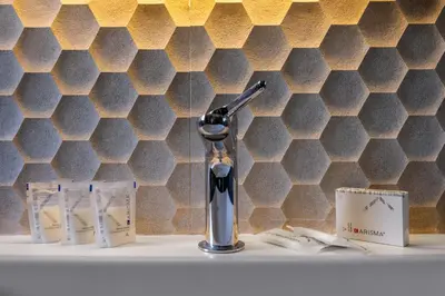 a bathroom sink with a toothbrush on a counter at Archimedes luxury apartment with terrace in Palermo