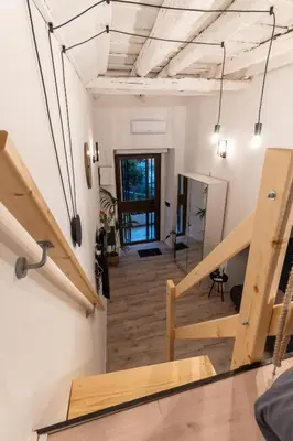 a view from the top of the stairs in a room at CasaCecè kalsa in Palermo