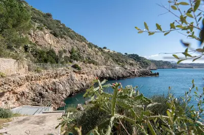 a view of a body of water next to a cliff at Villa Giacona Venuti in Terrasini