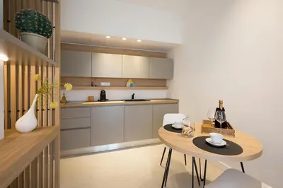 a bathroom with a sink and a toilet and a mirror at Giada Luxury Terrasini in Terrasini