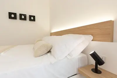 a bedroom with a bed and a bath tub at Giada Luxury in Terrasini