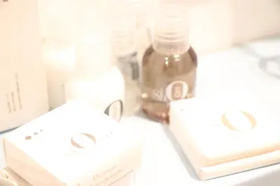 two white wii controllers sitting on a counter with bottles at mialuxuryhouse in Palermo