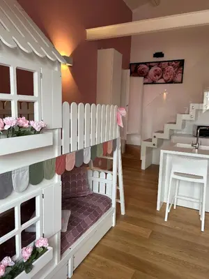 a dollhouse room with a sink and a table at mialuxuryhouse in Palermo
