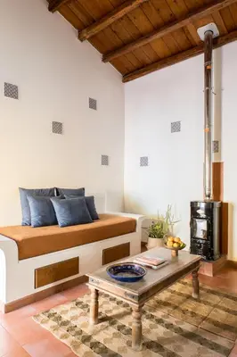 a living room with a couch and a coffee table at Tenuta dei Principi di Spadafora in Bosco Fraccia
