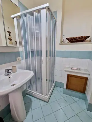 a bathroom with a shower and a sink at Old Town Loft - Palermo in Palermo