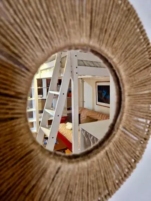 a circular view of a room with bunk beds at Old Town Loft - Palermo in Palermo
