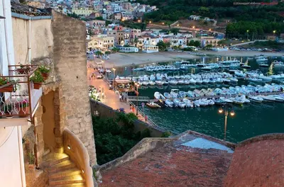 a view of a marina with boats in the water at Marconi e Garibaldi 76 apartment in Castellammare del Golfo