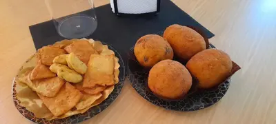 two plates of food and a plate of chips at BALLARHOUSE in Palermo