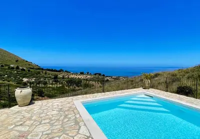 a swimming pool with a view of the ocean at Villa Felice - SEAVIEWS & PRIVATE POOL in Scopello