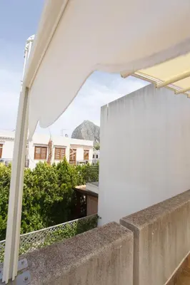 a view from the balcony of a house with a white canopy at SanVitoTour- Appartamento Smeraldo in San Vito lo Capo