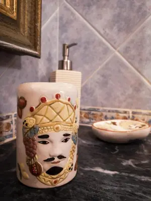 a bottle of soap sitting on top of a counter at Quintino 57 Al Politeama - Tourist Lease in Palermo