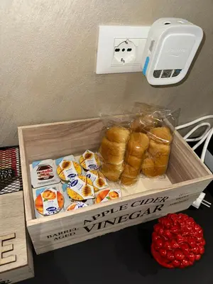 a box filled with different types of food on a table at ABT L'AURA in Palermo