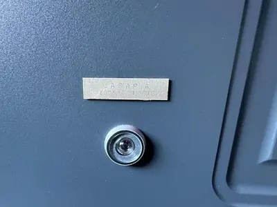 a label on a door with a metal button at Flat with Jacuzzi - Casa Pia in Mondello