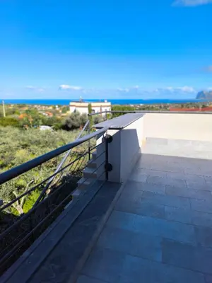 a balcony with a view of the ocean at Piante del Principe Apartments in Carini