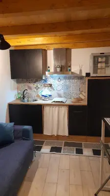 a kitchen with a sink and a counter top at Casa vacanza Gio in Palermo
