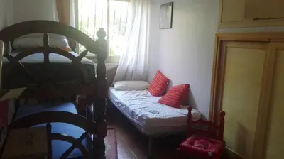 a bedroom with two bunk beds and a window at Villa Mare Ercole Luxury in Trappeto