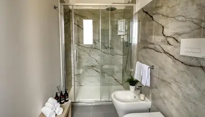 a bathroom with a sink and a mirror at Villa Dell'Ulivo con piscina privata By Sicily Home Solutions in Alcamo
