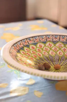 a plate sitting on top of a table at Belle Vue Sarmuci in Scopello
