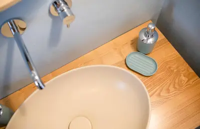 a bathroom with a glass shower with a sink at Le Tartane B&b Guidaloca in Castellammare del Golfo