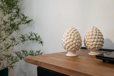 two egg sculptures sitting on top of a table at Don Mimì Leisure in Palermo