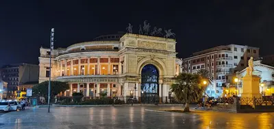 a large building in a city at night at NONNA MARI' in Palermo